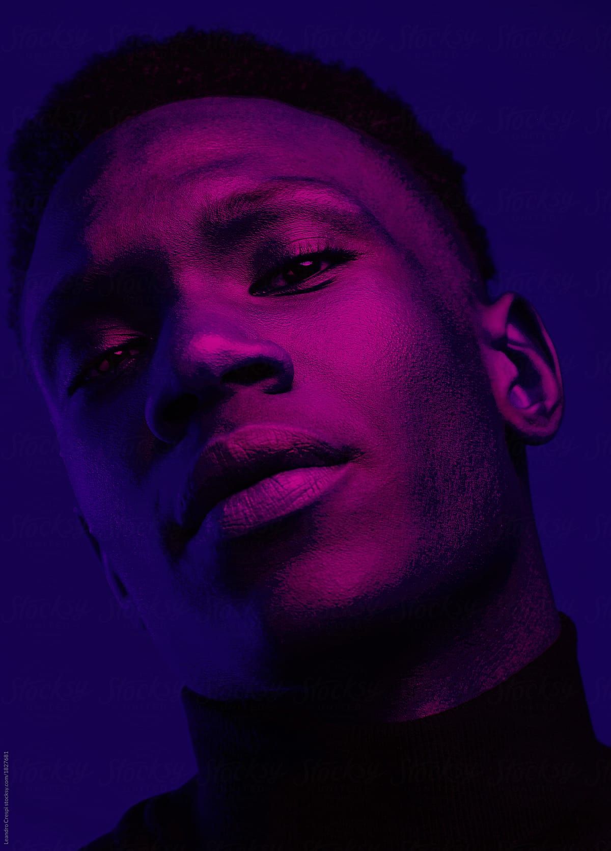 African-American-Man-Portrait-Under-Blue-And-Purple-Lights-Ultraviolet_-by-Stocksy-Contributor-_Ohlamour-Studio_.jpg